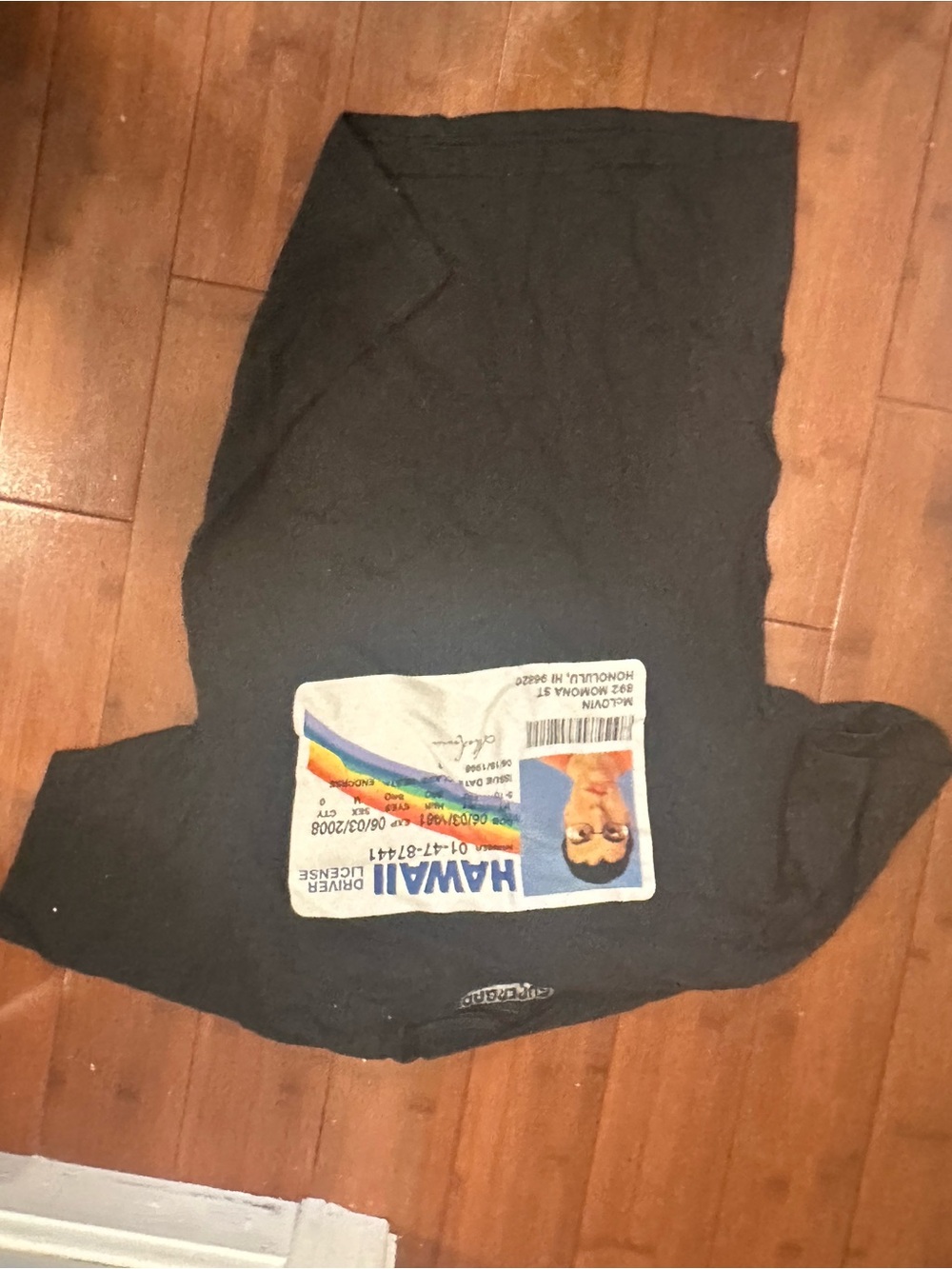 Mclovin Ripple Junction Black Short Sleeve Tee with Colorful Hawaiian ID Graphic